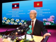 Tổng Bí thư: Tình đoàn kết Việt Nam - Lào là quy luật khách quan